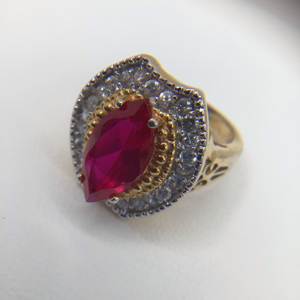 Vintage pinky ring, size 5. Pink and gold tone.